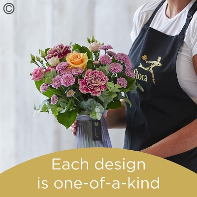 Hand tied bouquet and vase made with seasonal flowers